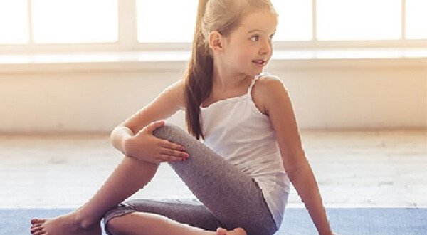 Kids participating in a fun and interactive yoga session